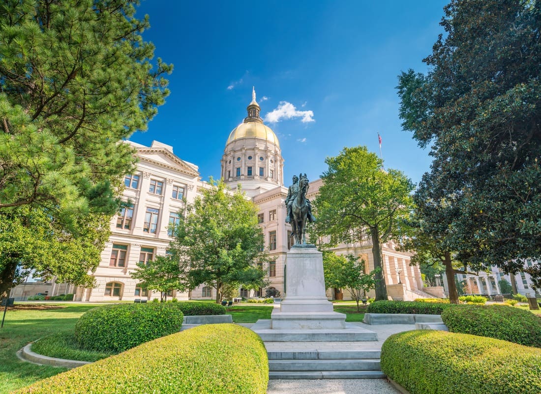 Atlanta, GA - Georgia State Capitol Building With Golden Dome And Bronze Equestrian Statue In Gardens